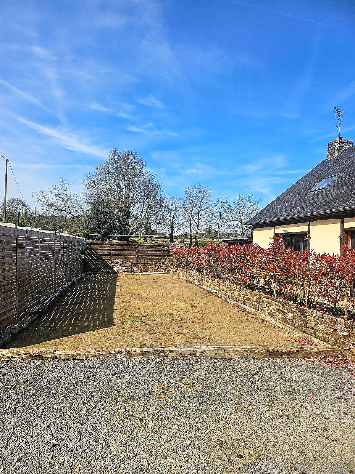 Pétanque (boules) court beside the house