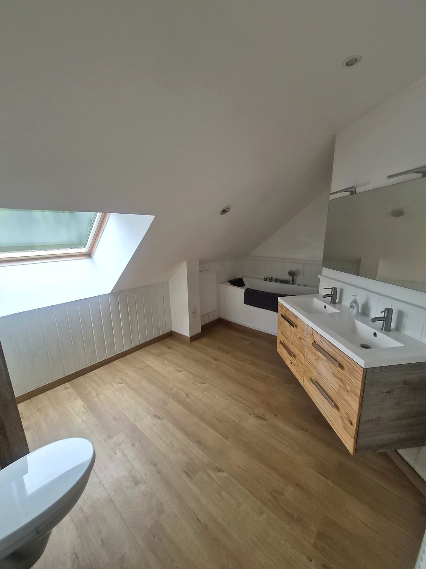 Bathroom with twin basins and bath
