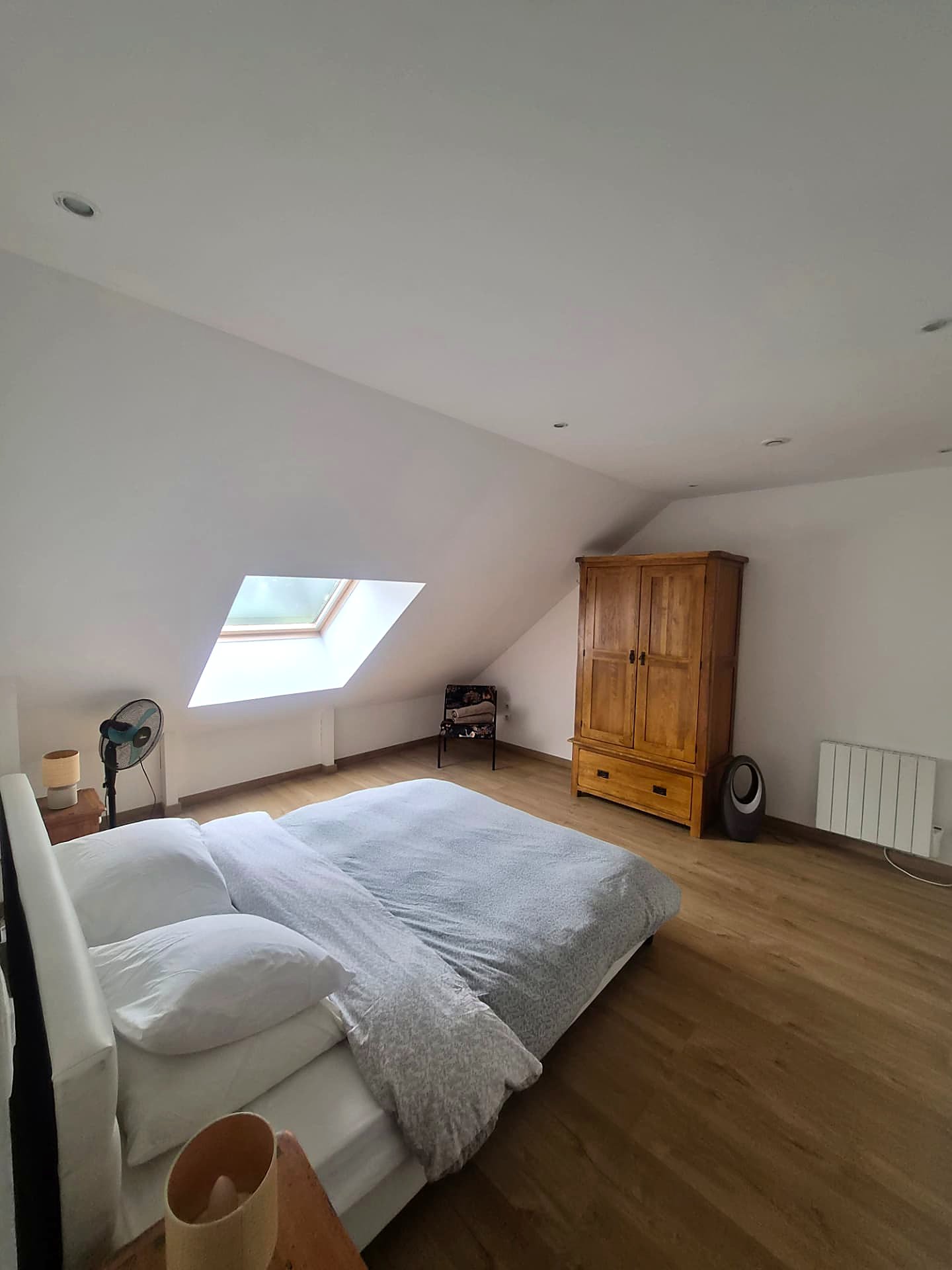 Walk through double bedroom with oak wardrobes